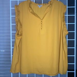 Sleeveless ruffle trim blouse
